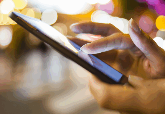 a person using a cell phone