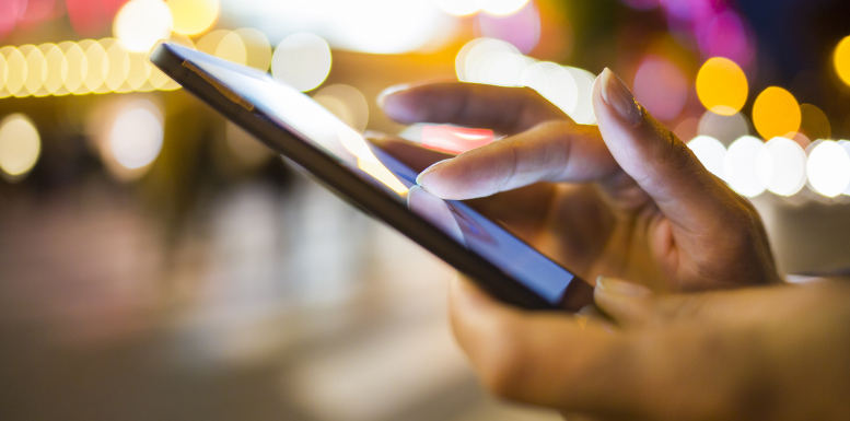 a person using a cell phone