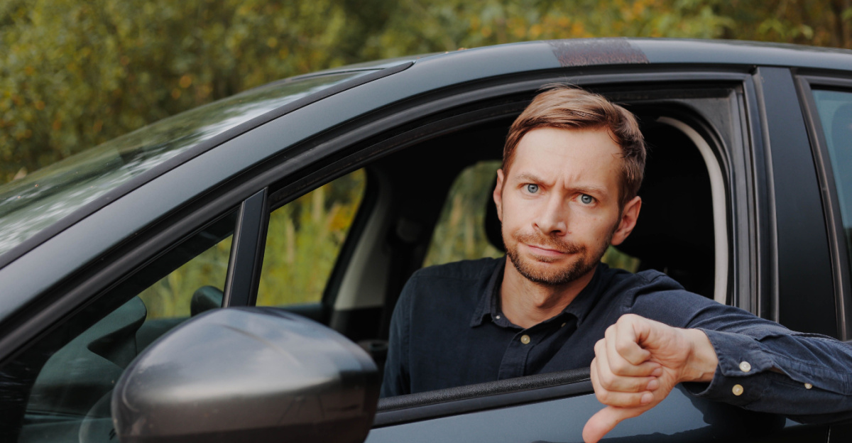 Man i bilen säger nej